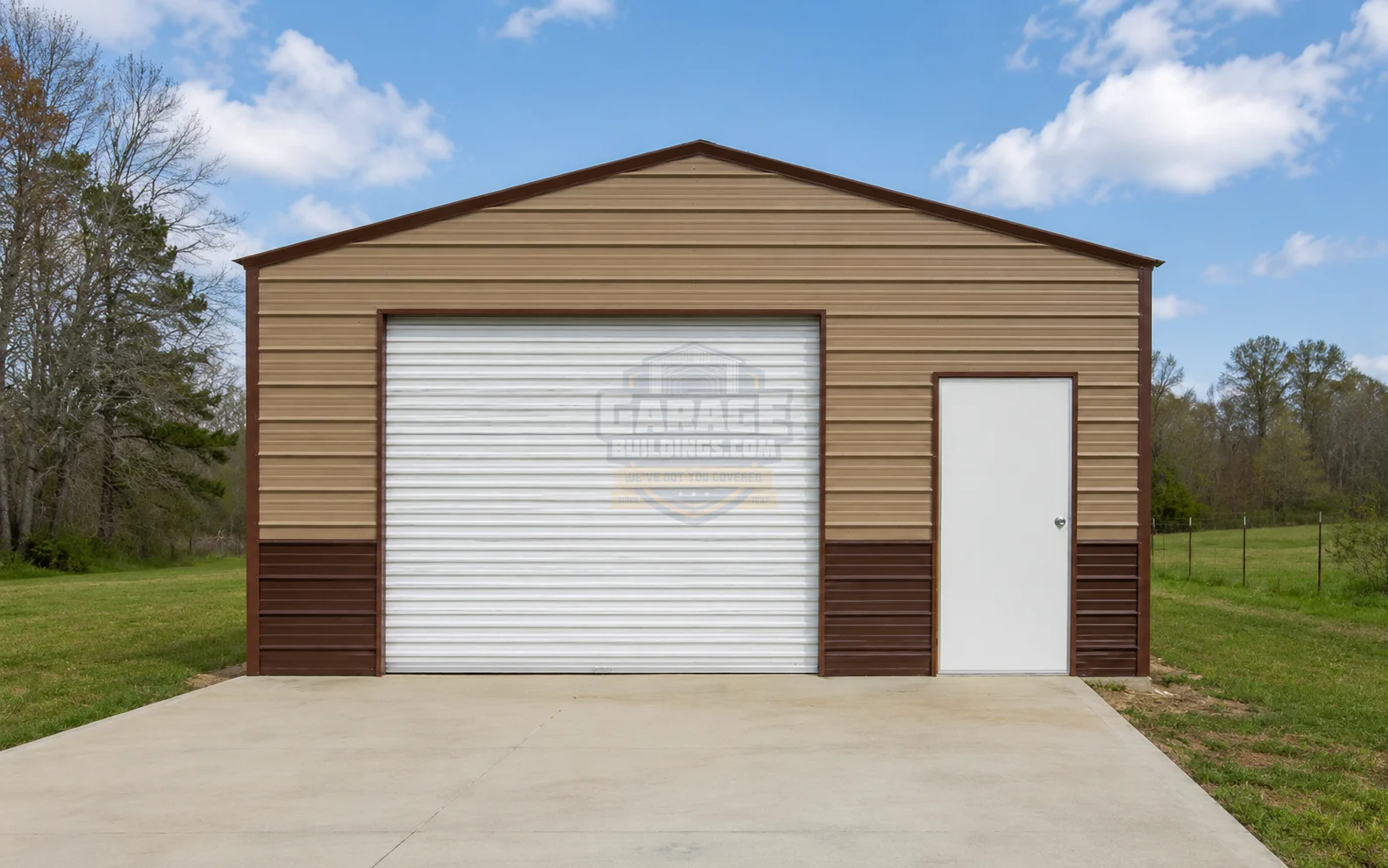 Storage garage with a roll-up door and side entrance, set in a grassy area