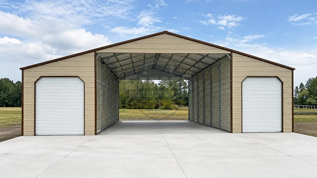 Large metal storage building with two roll-up doors and a concrete floor