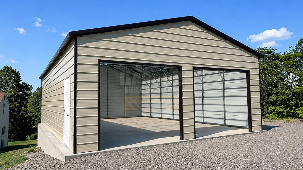 Large metal storage building with open front, situated on gravel
