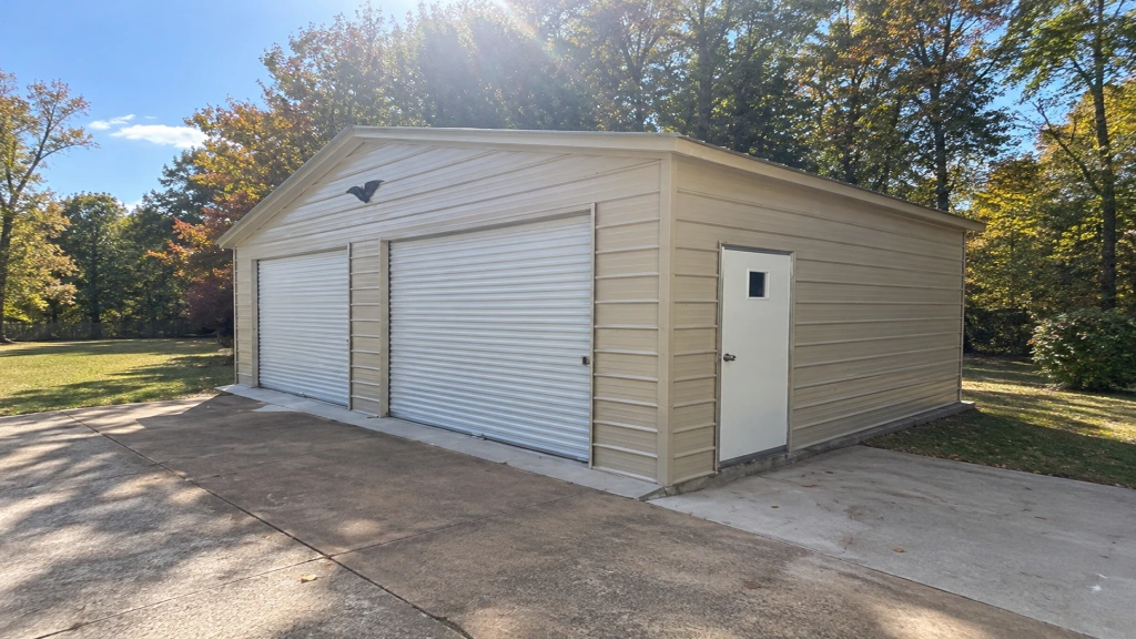 Two-garage storage building with a roll-up door and side entry